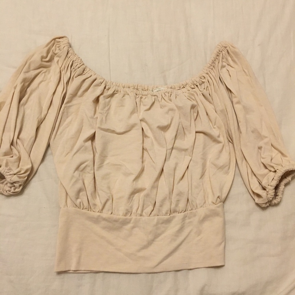 Stomach showing half shirt, can sit off shoulders